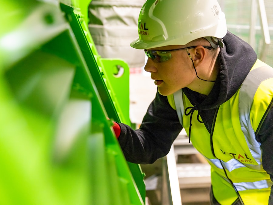 Engineer in hard hat and safety gear on a site inspection